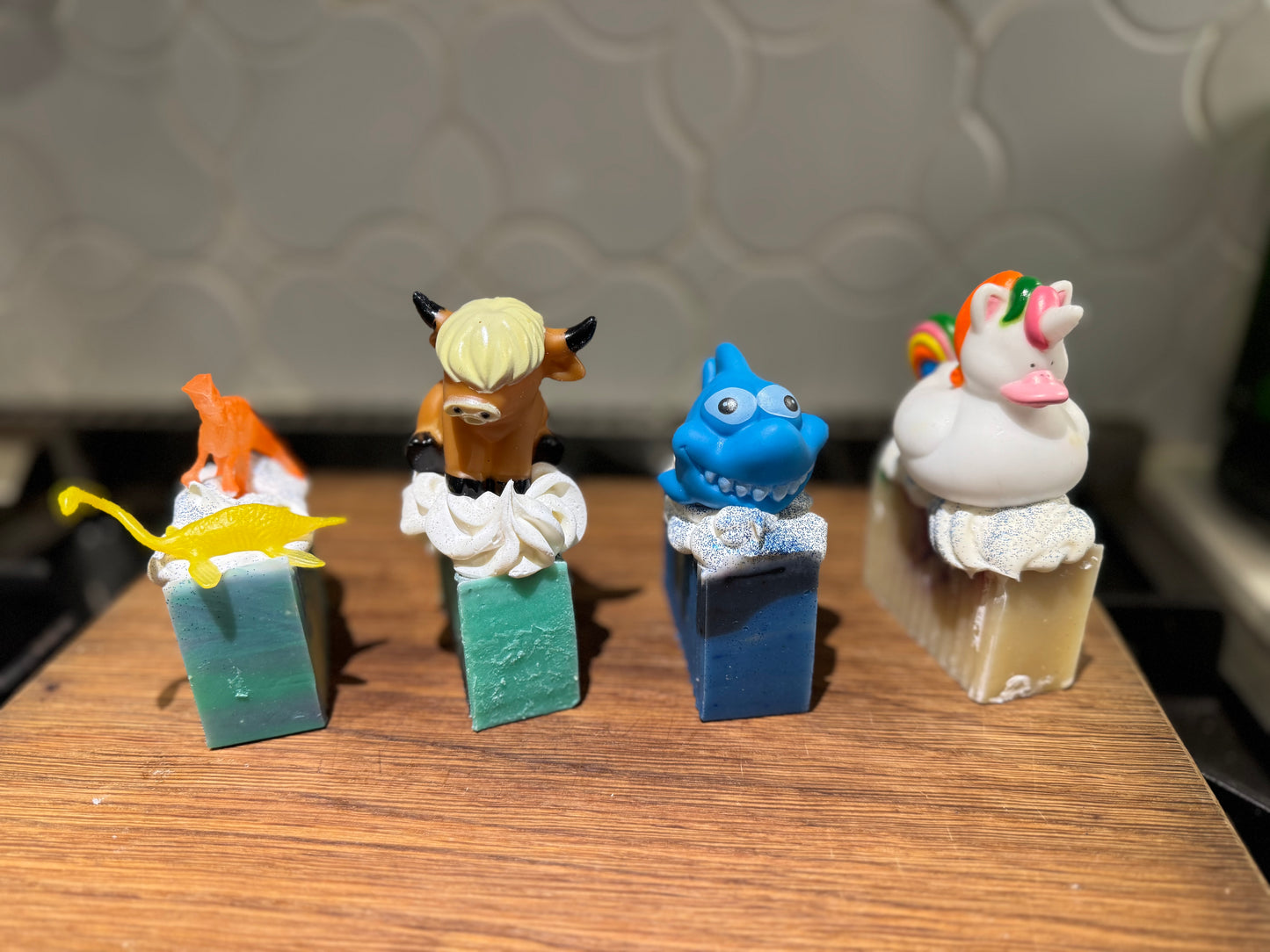LIMITED Kids Collection of Handmade Soaps including a Toy! Made with coconut milk and oatmeal. Glow in the dark!